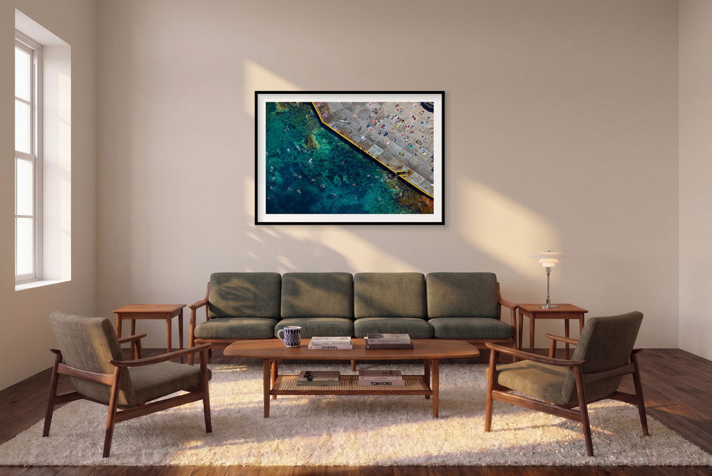 Clovelly Beach, Horizontal Print shown framed in a living room