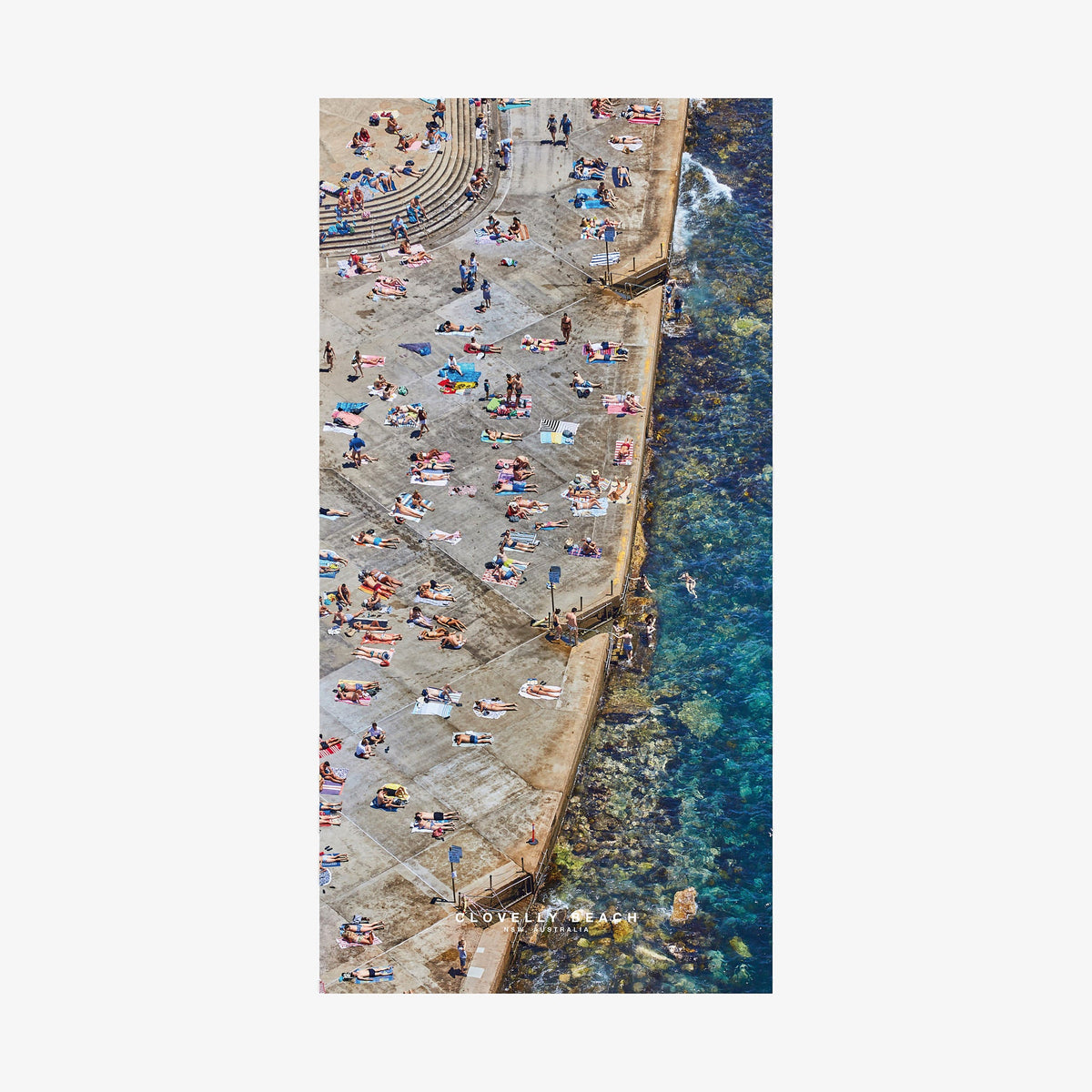 Aerial view of Clovelly Beach Sydney with sunbathers and turquoise water, quick-dry beach towel by Remy Gerega