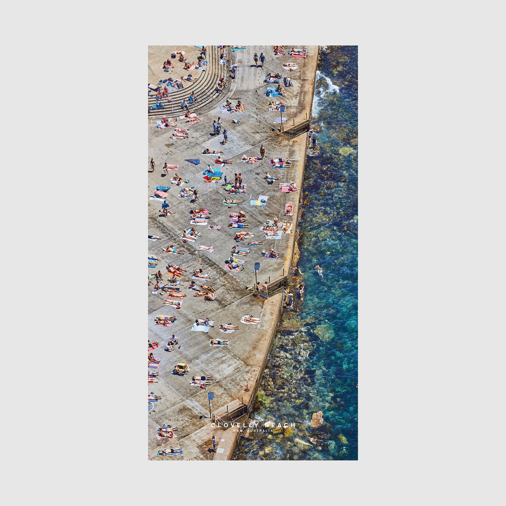 Aerial view of Clovelly Beach Sydney with sunbathers and turquoise water, quick-dry beach towel by Remy Gerega