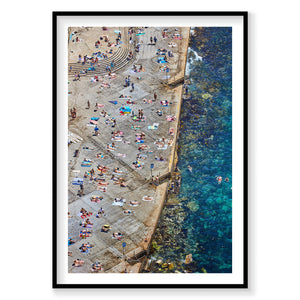 Aerial view of Clovelly Stairs beach with sunbathers and turquoise water, photography print by Remy Gerega