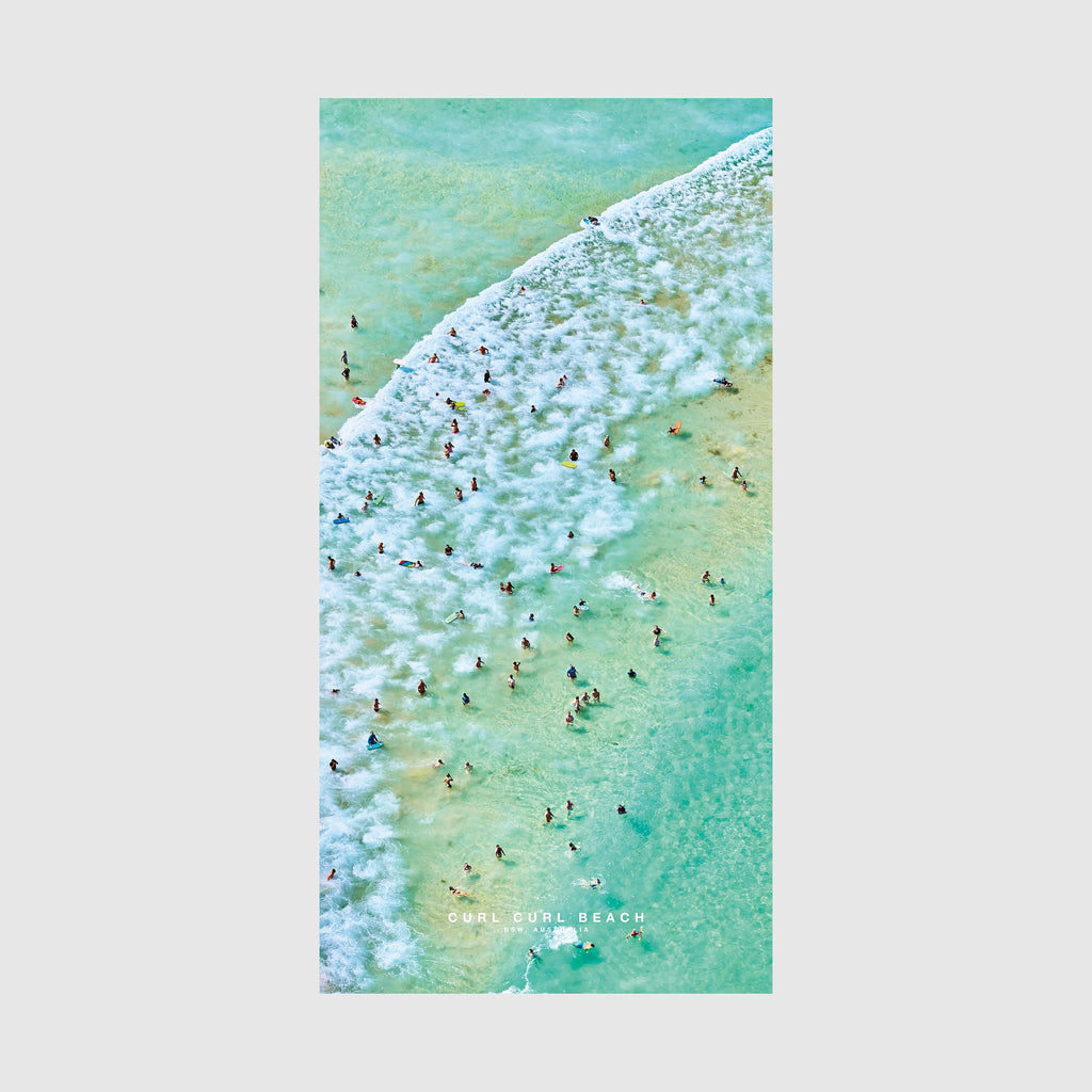 Aerial view of Curl Curl Beach with swimmers and turquoise waves, quick-dry beach towel by Remy Gerega