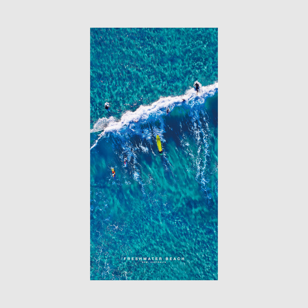 Aerial view of Freshwater Beach NSW with surfers and waves,quick-dry beach towel by Remy Gerega