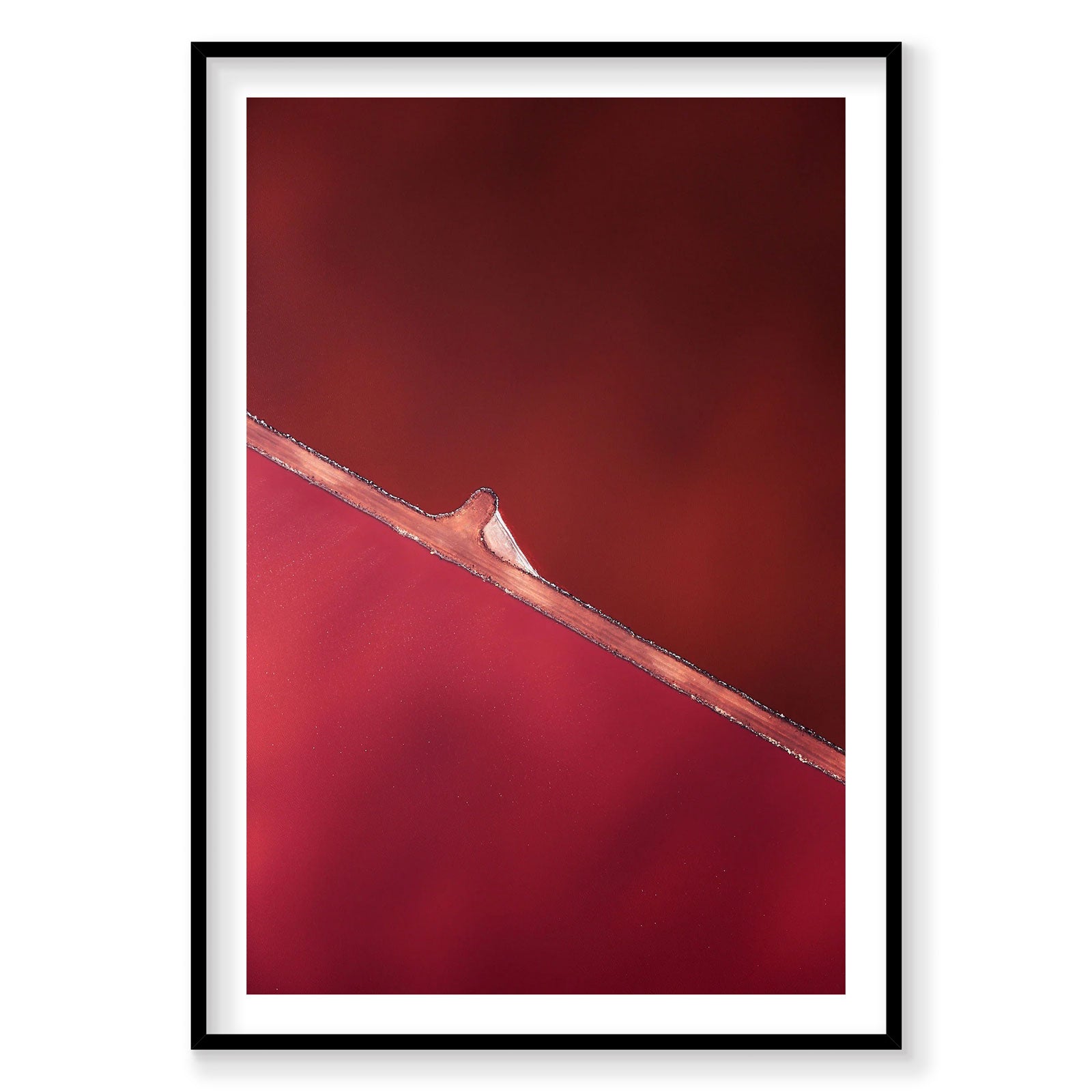 Aerial view of Hutt Lagoon's pink and red salt waters with wooden pier, photography print by Remy Gerega