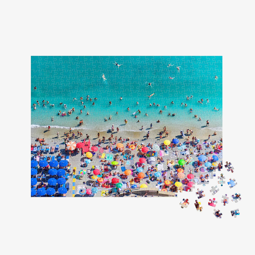 Aerial view of Monterosso al Mare beach with colorful umbrellas and swimmers, 500 piece jigsaw puzzle by Remy Gerega