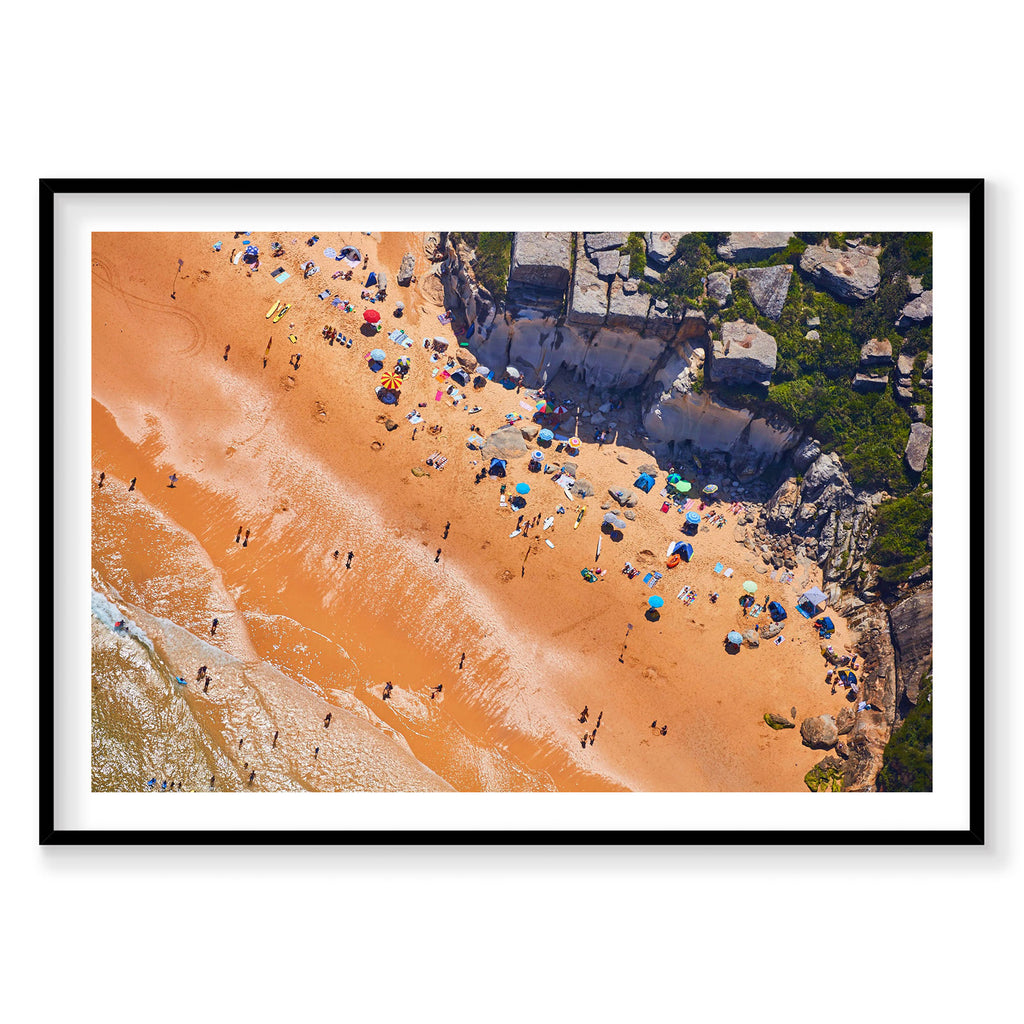 Aerial view of North Curl Curl Beach with golden sand, colorful umbrellas and swimmers, photography print by Remy Gerega