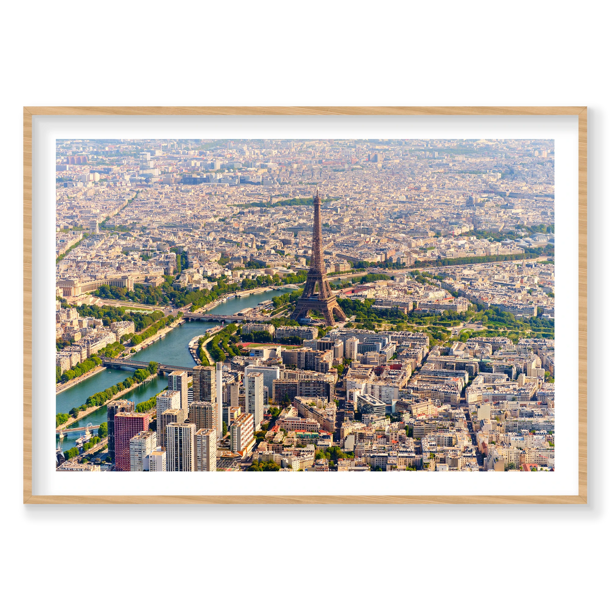 Wide aerial view of the Eiffel Tower, the Seine, bridges and surrounding Paris rooftops in daylight; natural timber frame
