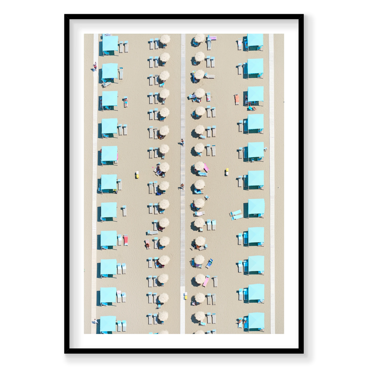 Rows of turquoise cabanas, pale umbrellas and sunloungers on the sand at Viareggio, Tuscany, Italy, black frame.