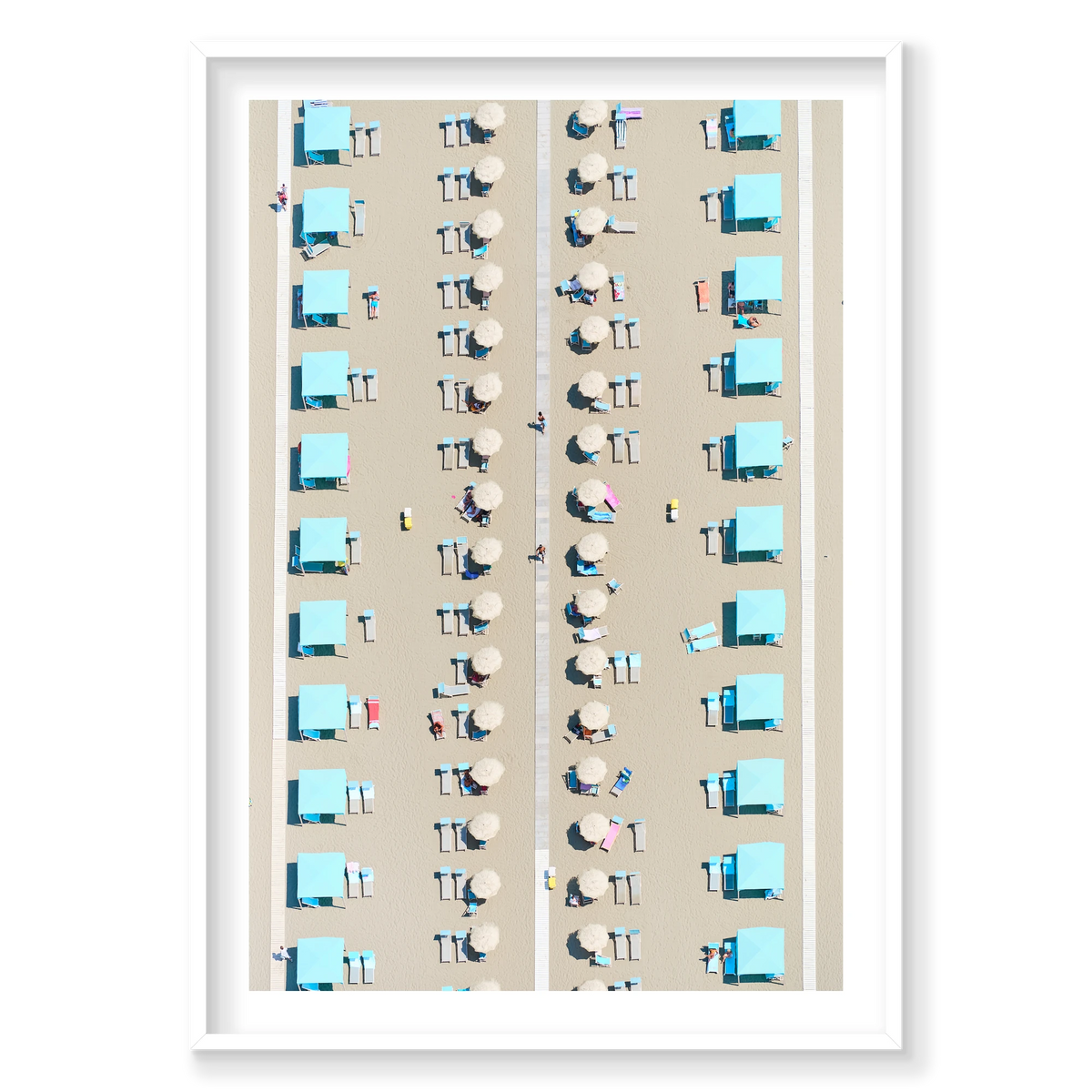 Rows of turquoise cabanas, pale umbrellas and sunloungers on the sand at Viareggio, Tuscany, Italy, white frame.