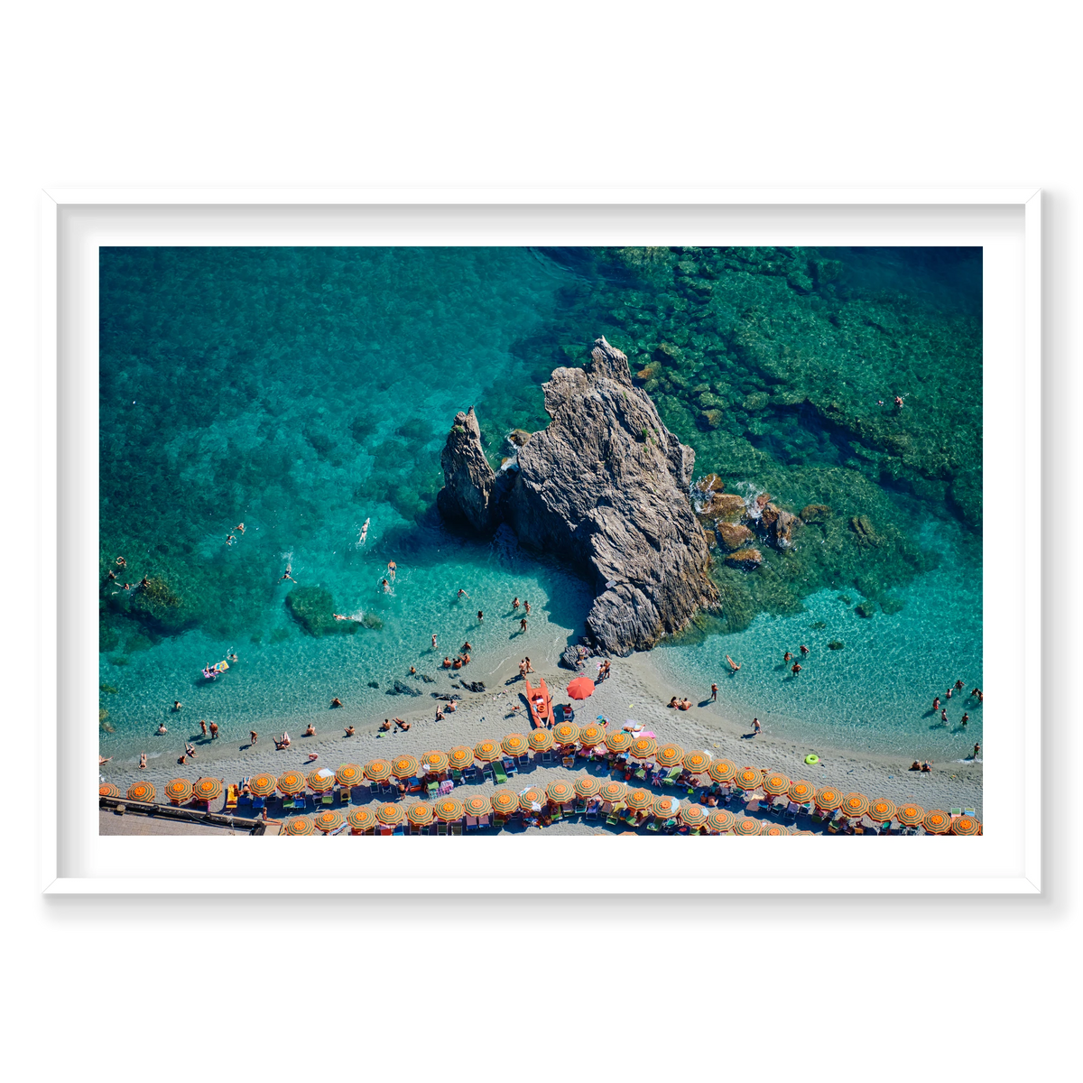 Scoglio di Fegina rock surrounded by swimmers and turquoise water, with orange-striped umbrellas at Monterosso al Mare, Cinque Terre, Italy, white frame.