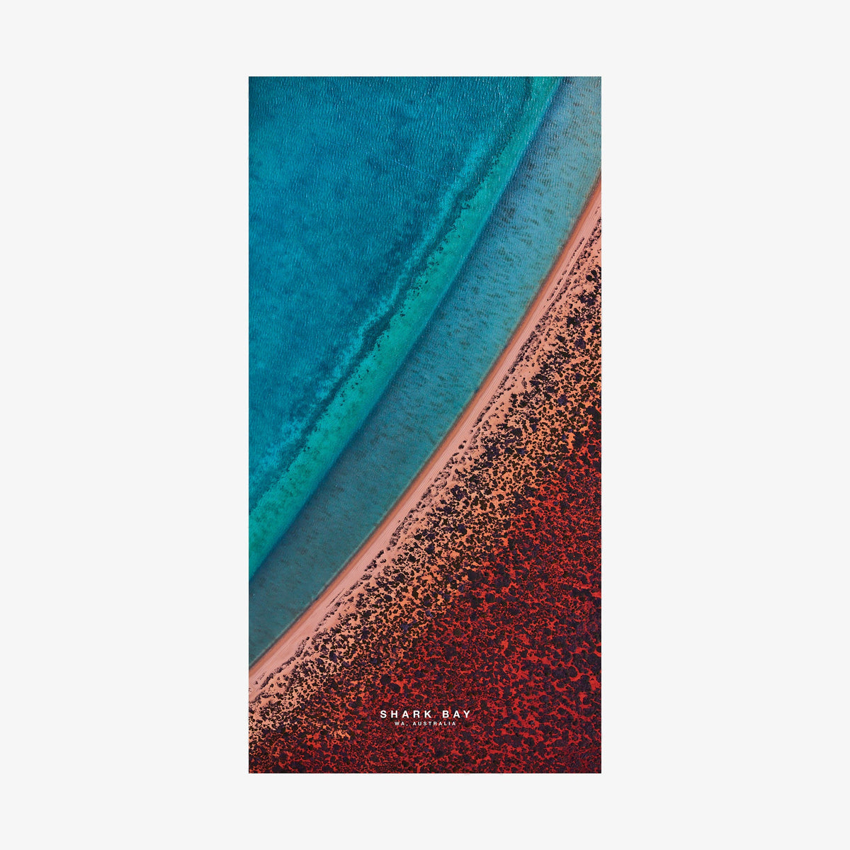 Aerial view of Shark Bay Western Australia with turquoise water and red algae-covered shoreline, quick-dry beach towel by Remy Gerega