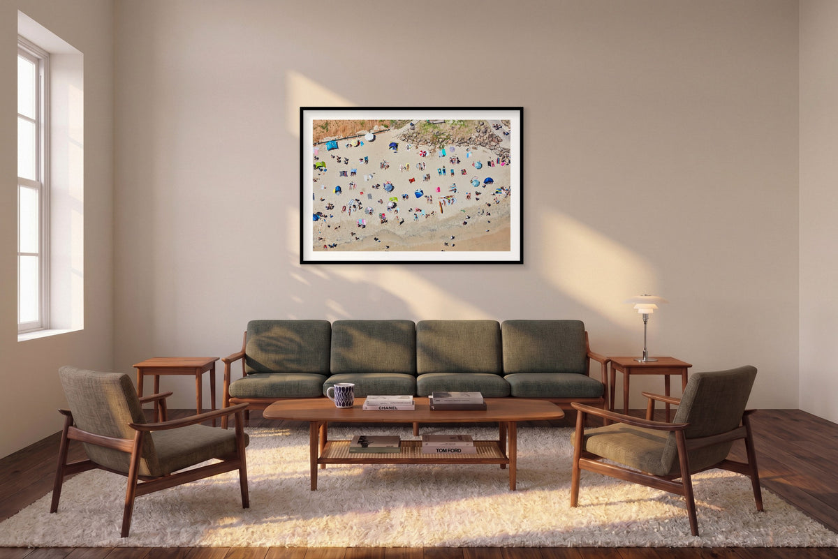 Sunbathers, Byron Bay, Horizontal Print shown framed in a living room