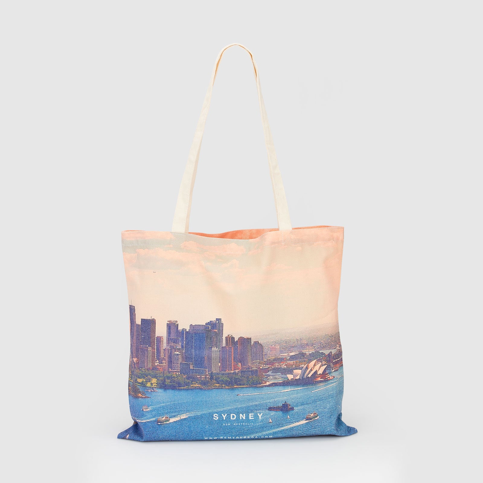 Sydney Harbour cityscape with Opera House and blue waters, canvas tote bag by Remy Gerega