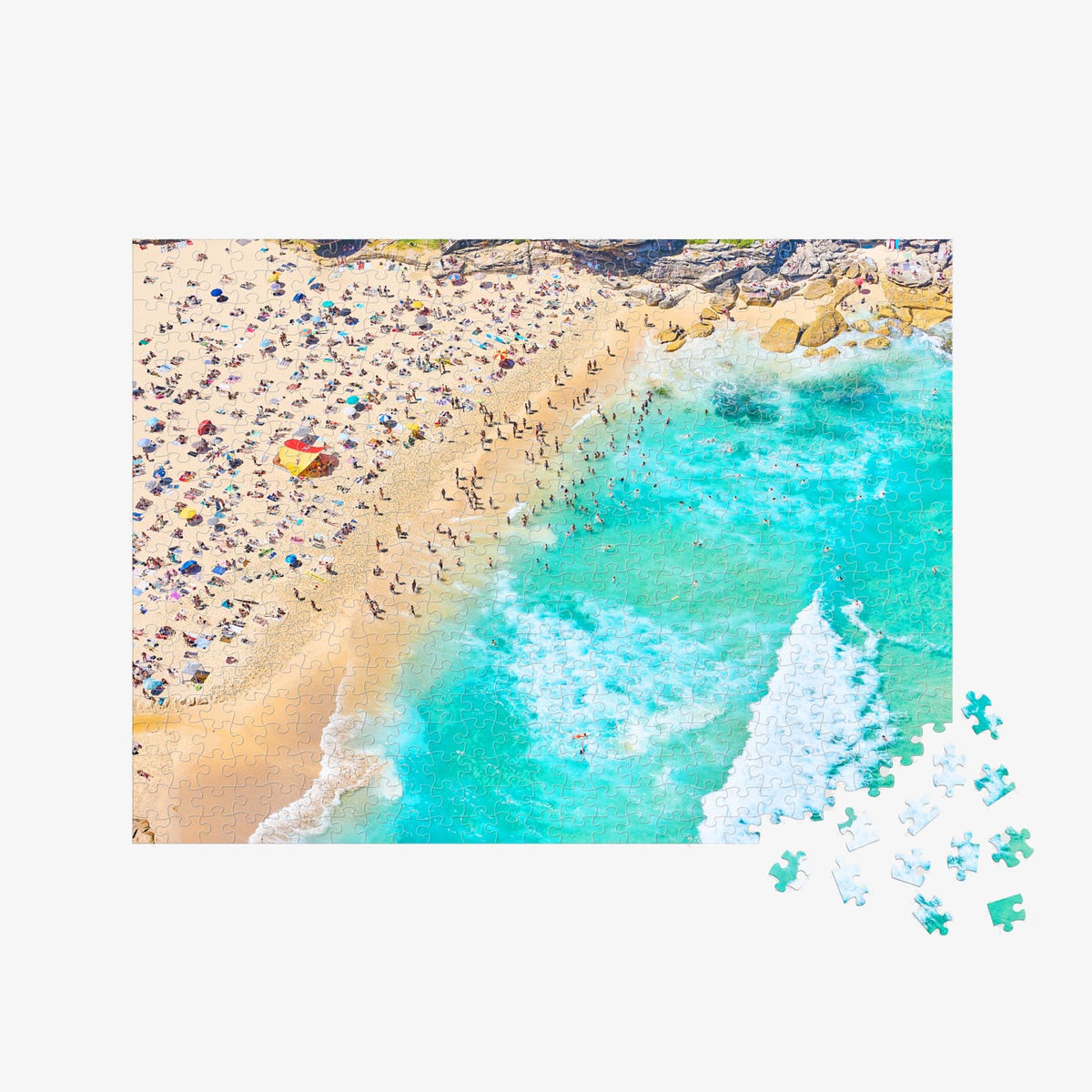 Aerial view of Tamarama Beach with turquoise water and colorful umbrellas, 500 piece jigsaw puzzle by Remy Gerega