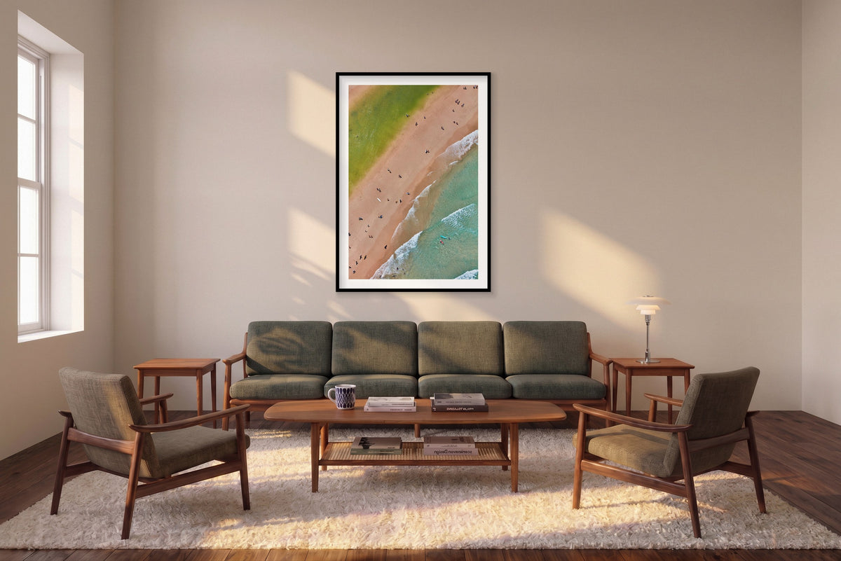The Pass, Byron Bay, Vertical Print shown framed in a living room