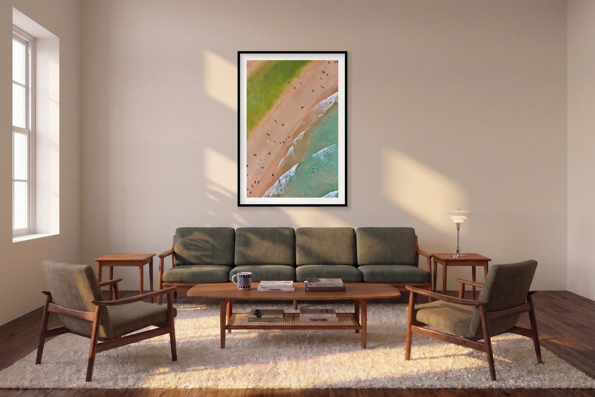 The Pass, Byron Bay, Vertical Print shown framed in a living room
