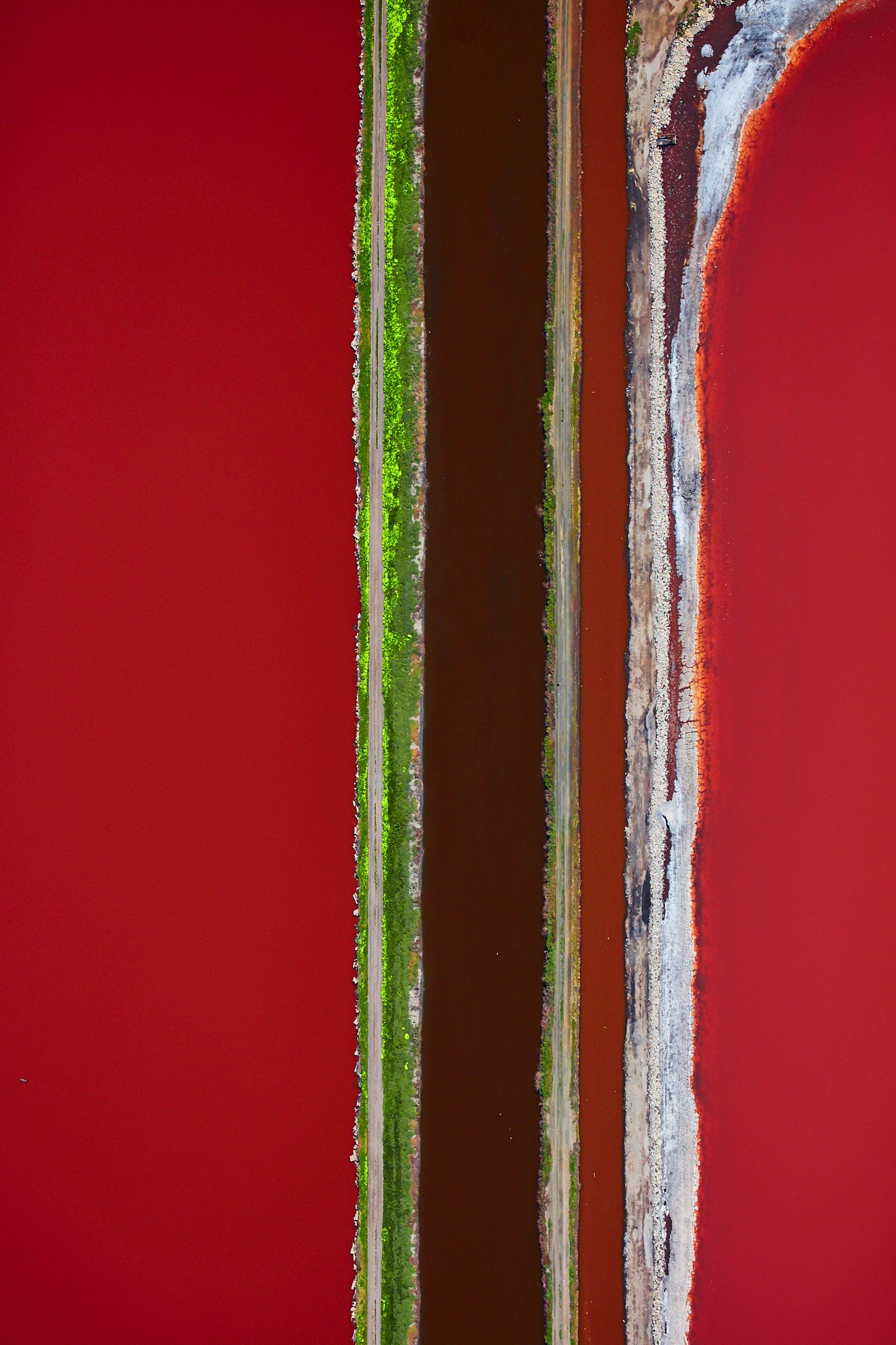 Aerial photography from a doorless R22 helicopter over the San Francisco Bay Cargill Salt Ponds. Limited & open edition fine art prints available for purchase. 