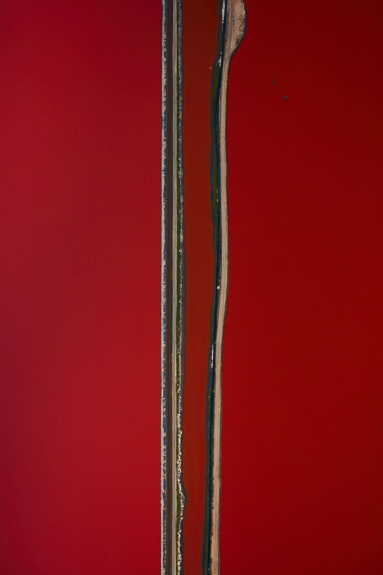 Aerial photography from a doorless R22 helicopter over the San Francisco Bay Cargill Salt Ponds. Limited & open edition fine art prints available for purchase. 