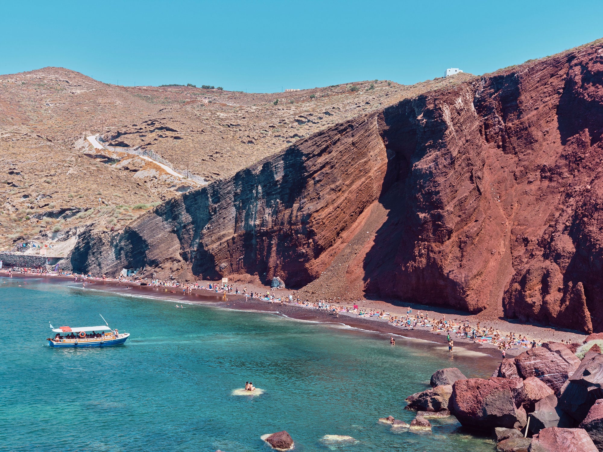 Red Beach Santorini Greece with turquoise waters and red volcanic cliffs, photography print by Remy Gerega