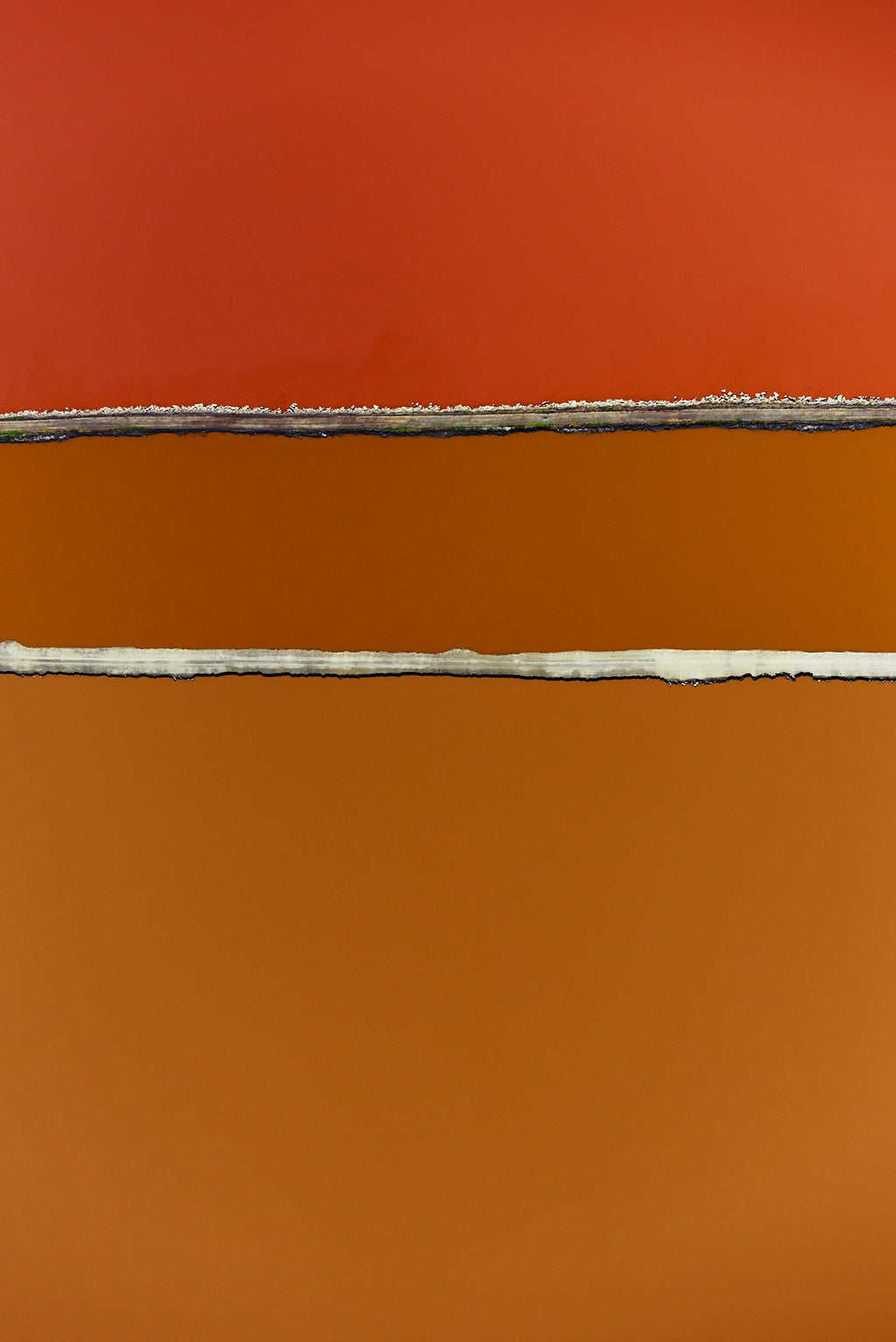 Aerial photography from a doorless R22 helicopter over the San Francisco Bay Cargill Salt Ponds. Limited & open edition fine art prints available for purchase. 