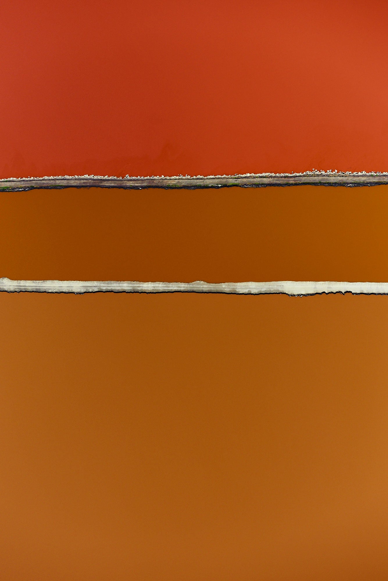 Aerial photography from a doorless R22 helicopter over the San Francisco Bay Cargill Salt Ponds. Limited & open edition fine art prints available for purchase. 