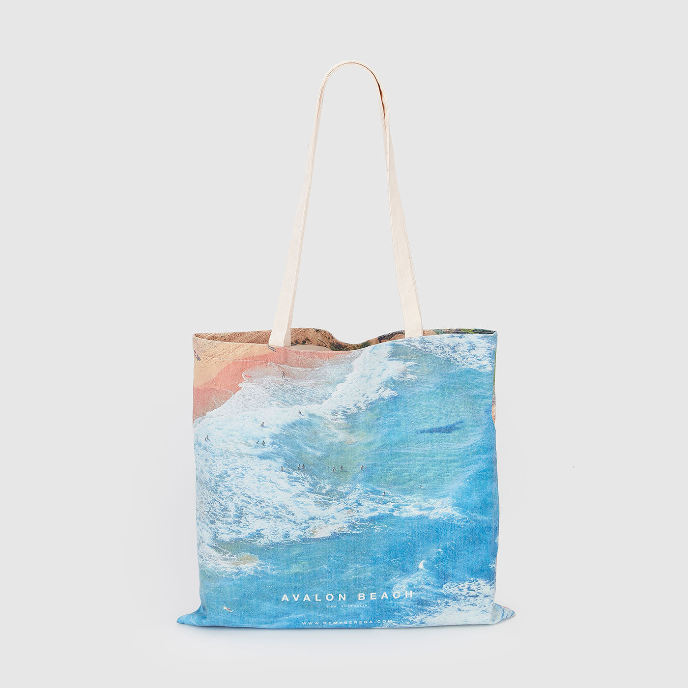 Avalon Beach aerial view with turquoise waves and pink sand, canvas tote bag by Remy Gerega