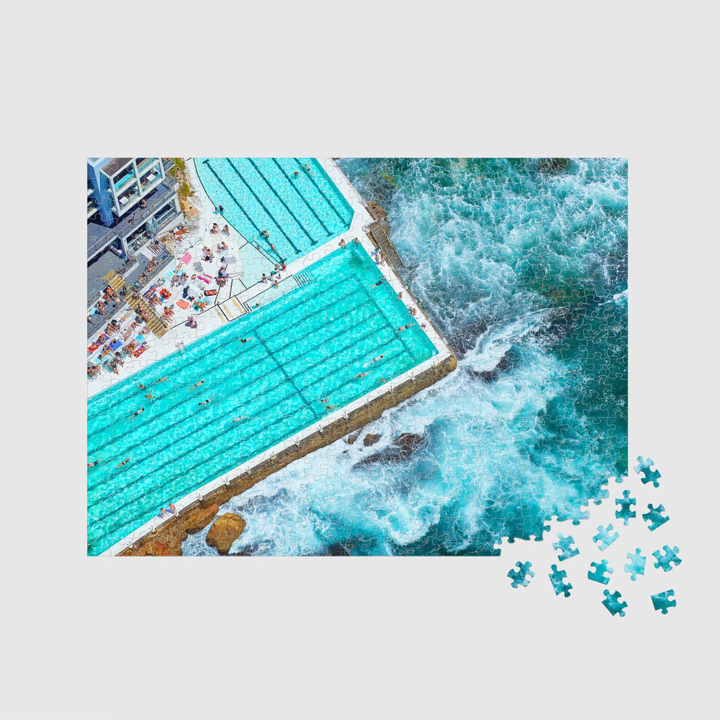 Aerial view of Bondi Beach swimming pool with turquoise water and crashing ocean waves, 500 piece jigsaw puzzle by Remy Gerega