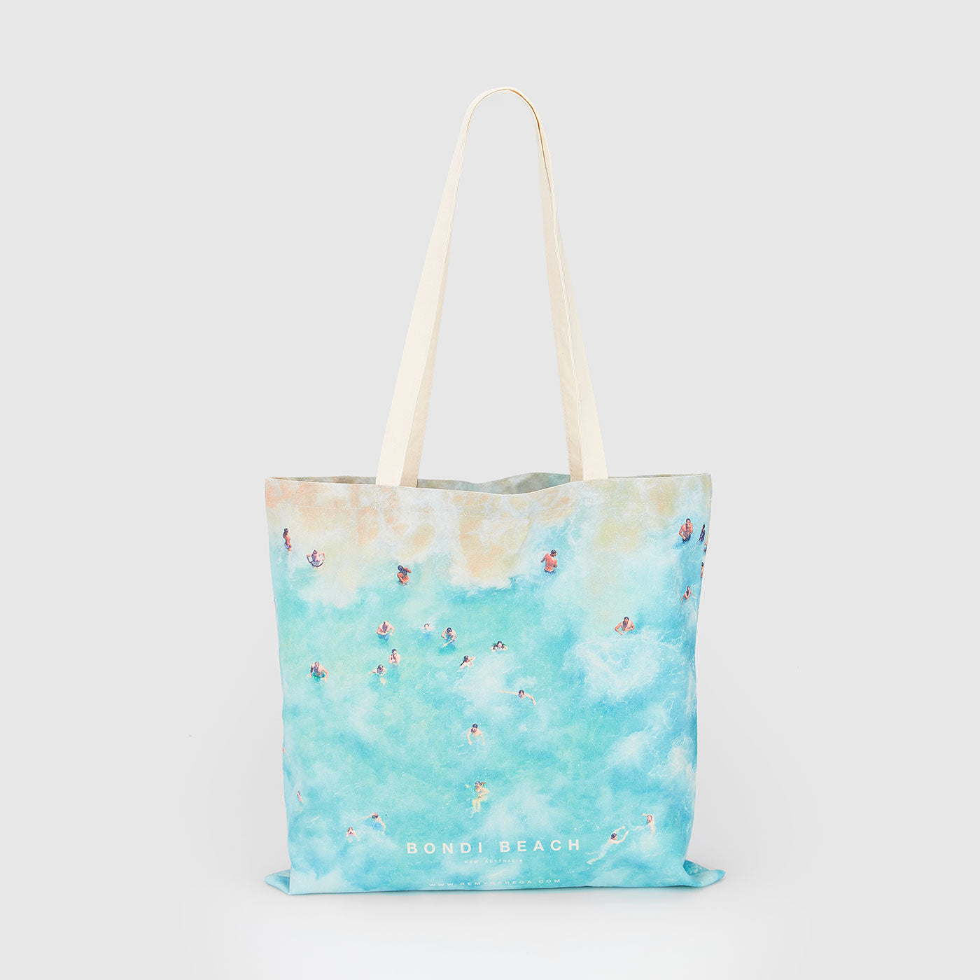 Aerial view of Bondi Beach swimmers in turquoise ocean water from above, canvas tote bag by Remy Gerega