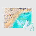 Aerial view of Tamarama Beach with turquoise water and colorful umbrellas, 500 piece jigsaw puzzle by Remy Gerega